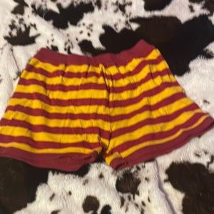 a pair of harry potter Gryffindor shorts